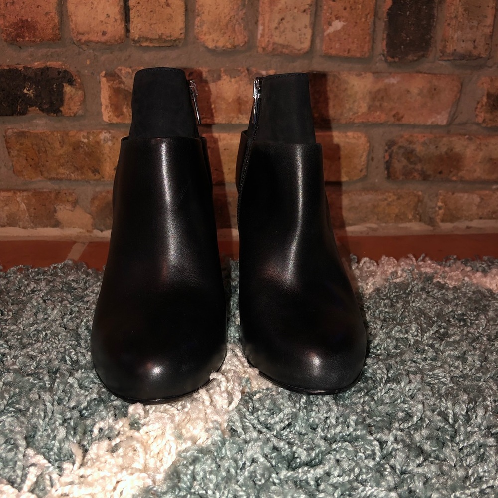 Vince black vero booties, fits like a size 7.